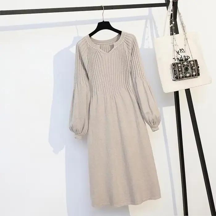 Robe en tricot noir pour femmes juniors, mode élégante avec manches lanternes et longueur aux genoux