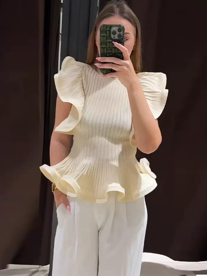 Blouse pull femme en maille côtelée
