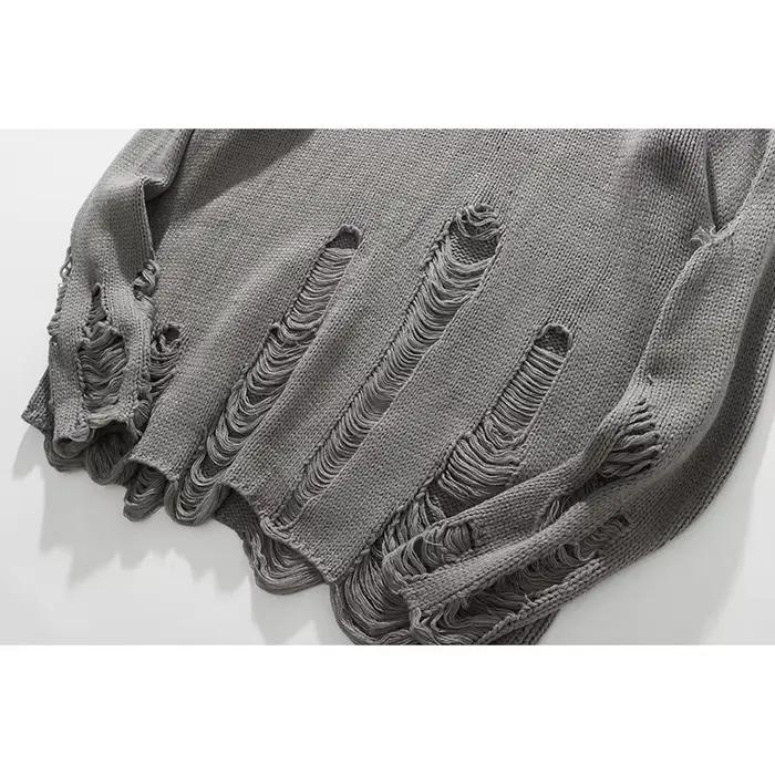Pull unisexe déchiré avec trous de lavage