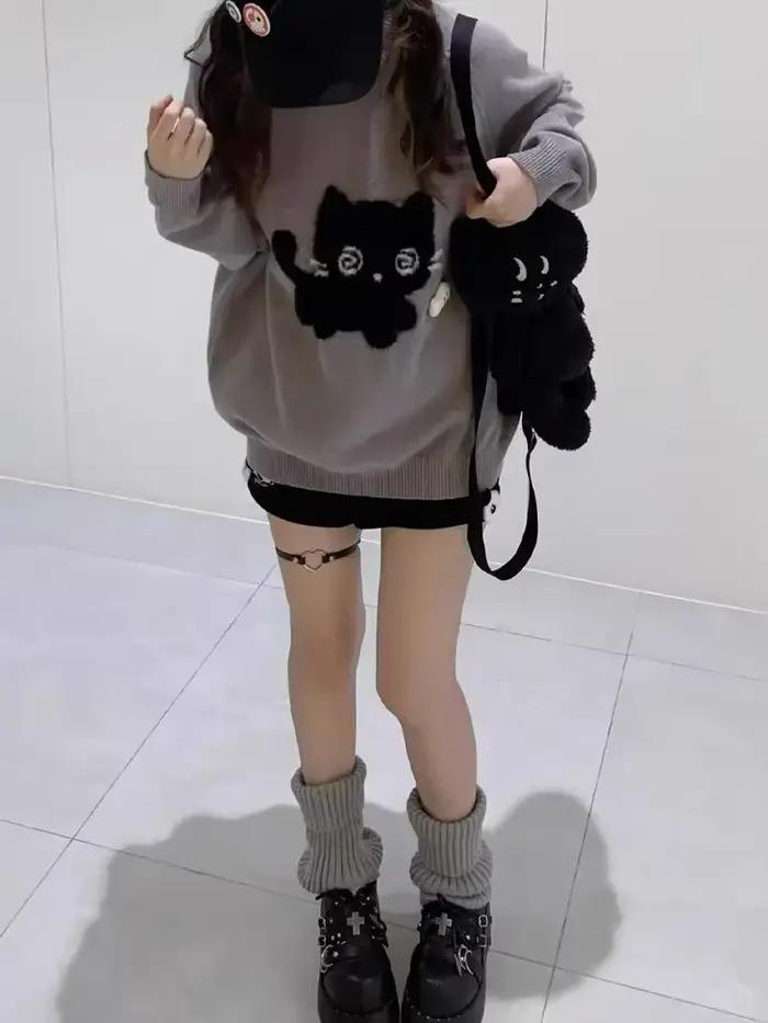 Pull en tricot gris à col rond pour femme