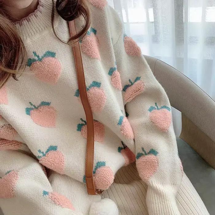 Pull en maille couleur pêche pour femme
