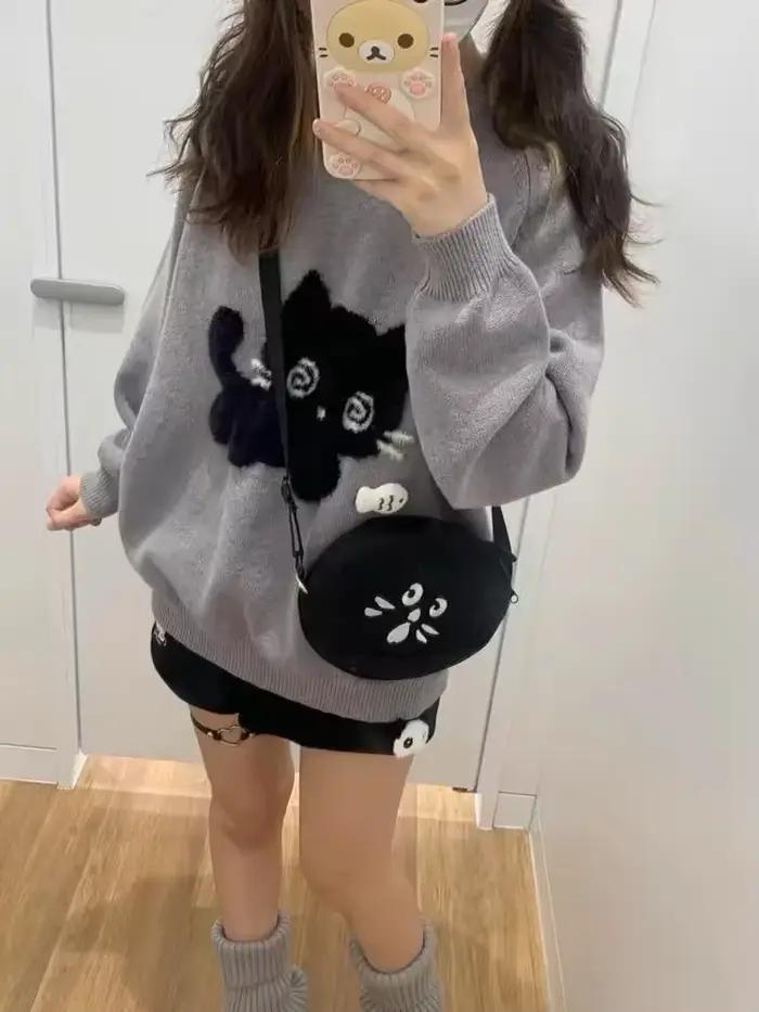Pull en tricot gris à col rond pour femme