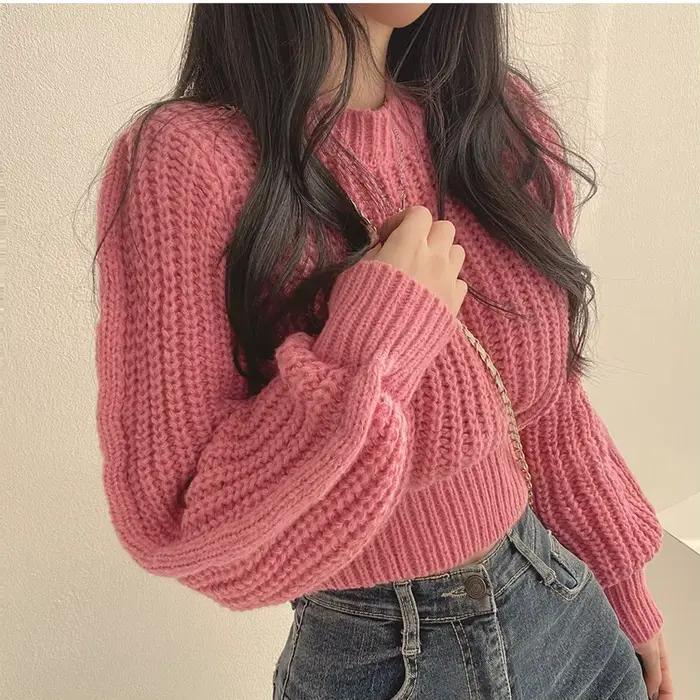 Pull rose à manches bouffantes