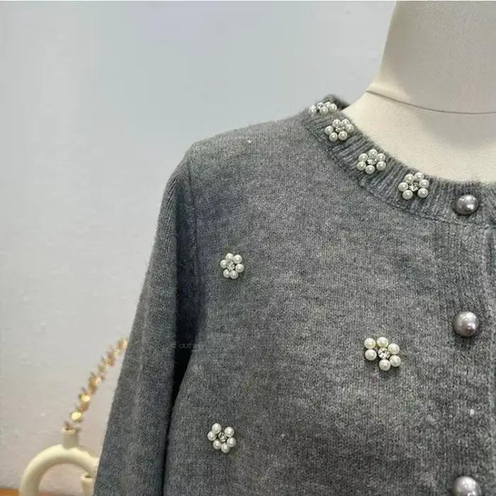 Pull élégant à perles pour femmes