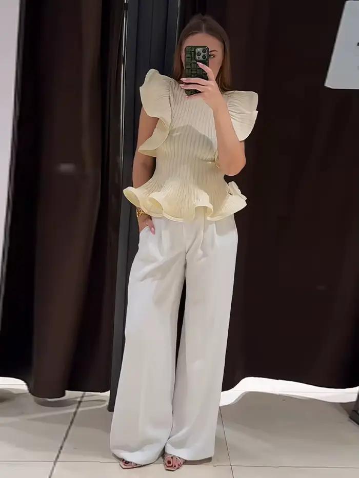 Blouse pull femme en maille côtelée