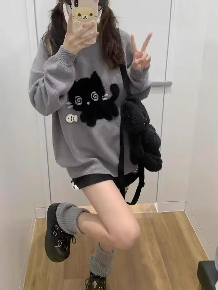 Pull en tricot gris à col rond pour femme