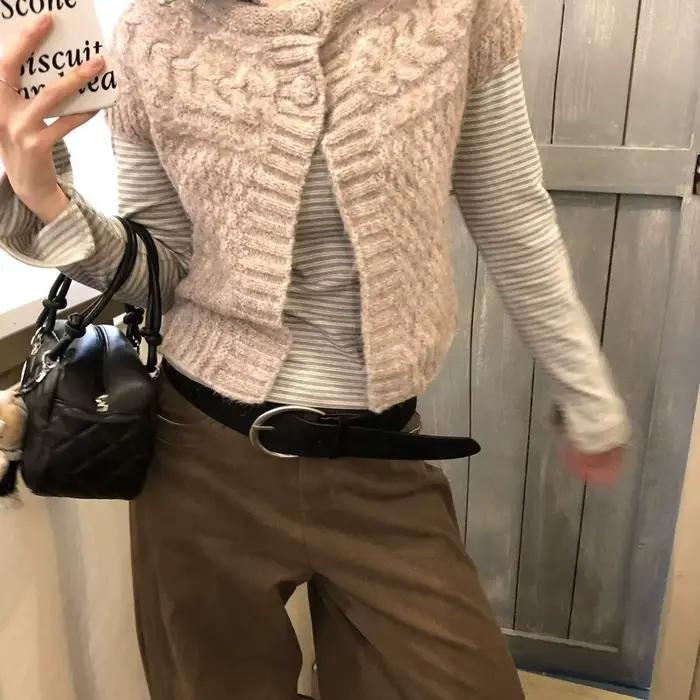 Cardigan gris torsadé en maille pour femme