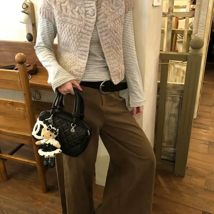 Cardigan gris torsadé en maille pour femme