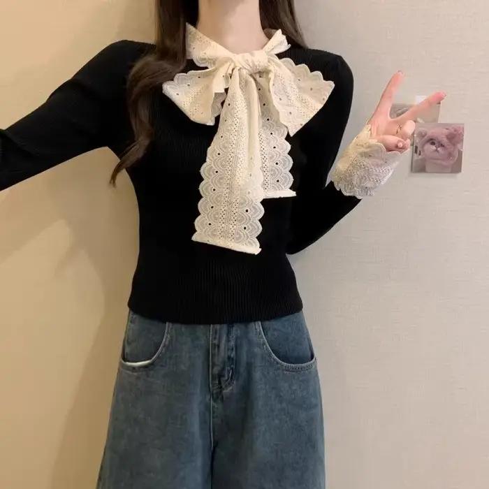 Pull en tricot avec nœud rouge pour femme