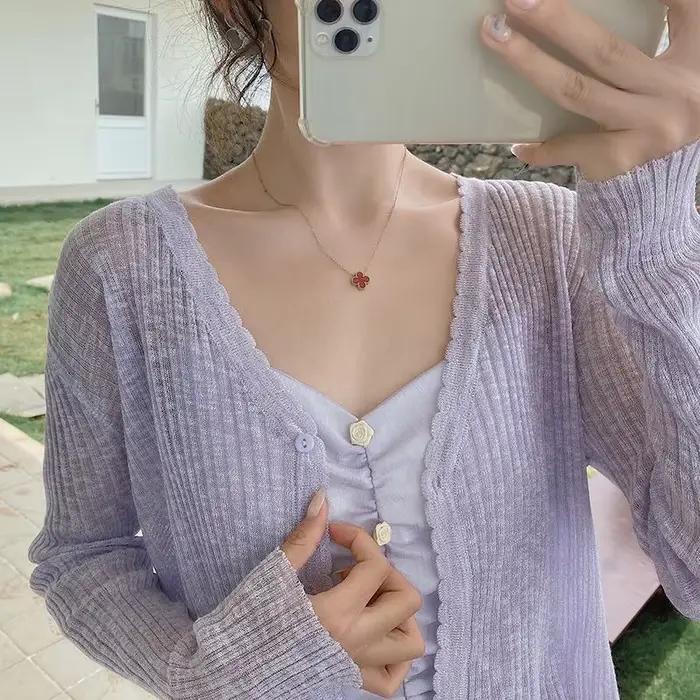 Sunproof-Cardigan évidé pour femme