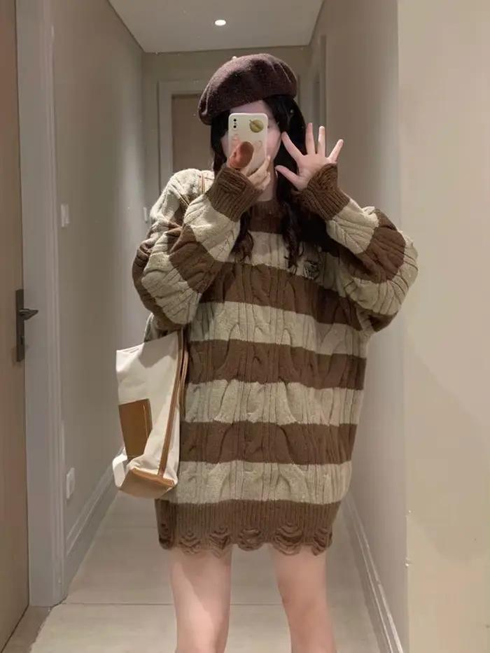 Pull rayé torsadé déchiré pour femme
