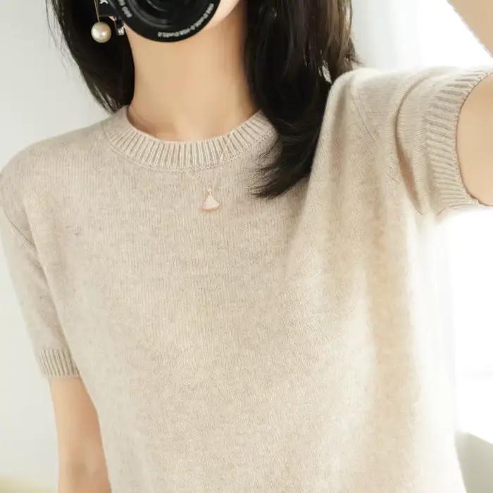 Pull tricoté à manches courtes et col rond pour femme