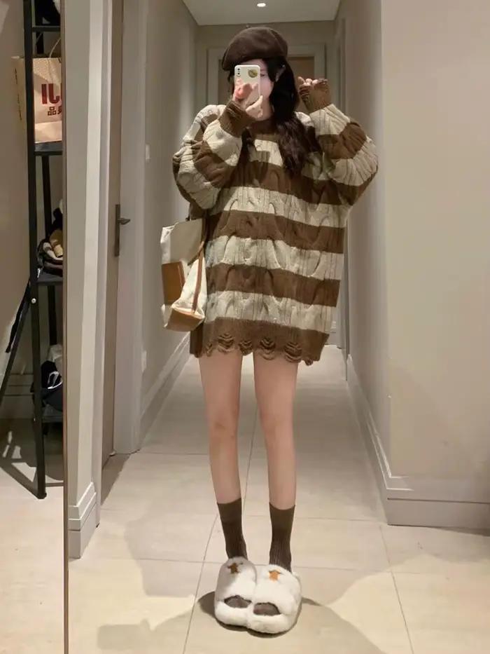 Pull rayé torsadé déchiré pour femme