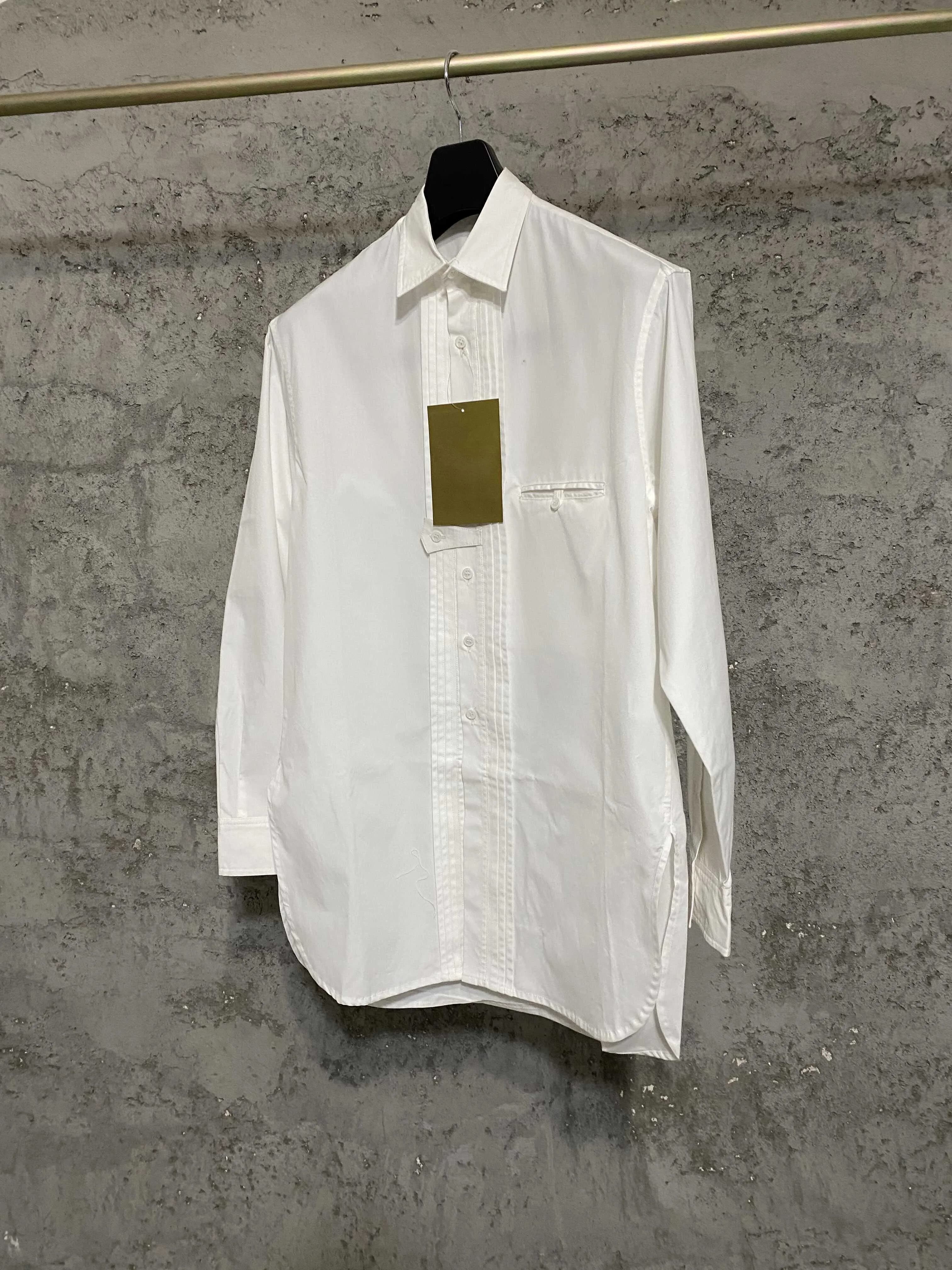 Conception originale, petit col montant, chemise blanche décontractée sans col à manches longues en 