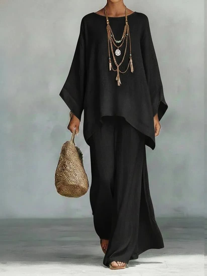 Ensemble élégant femme printemps 2026 : pull à col rond et pantalon long, tenue décontractée simple 