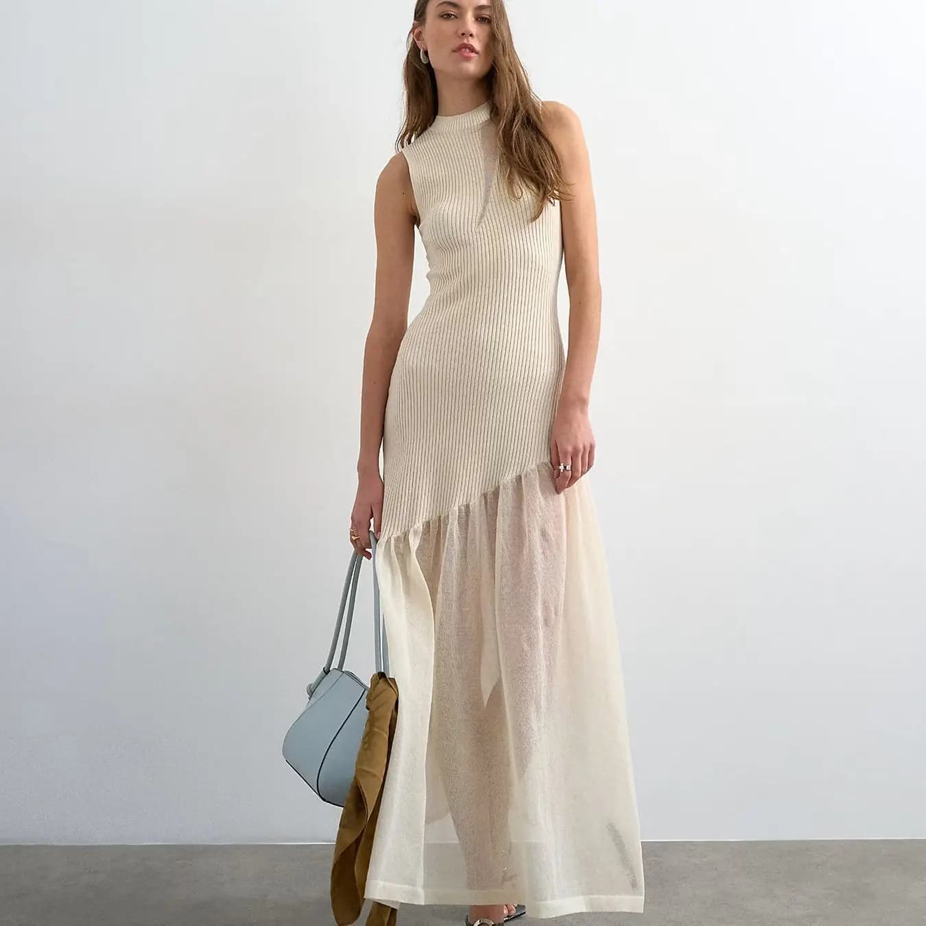 Robe en maille légère et élégante pour femme, sans manches, avec empiècements en maille, design asym