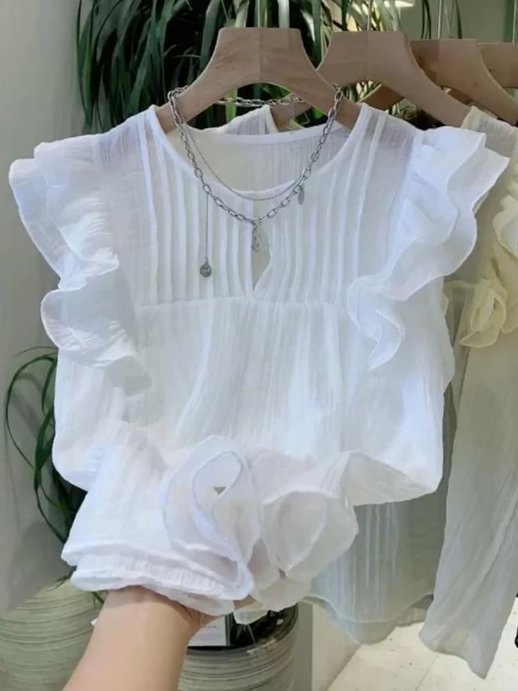 Chemisiers blancs à col rond pour femmes, chemises à volants, chemisier d'été vintage, mode 2025