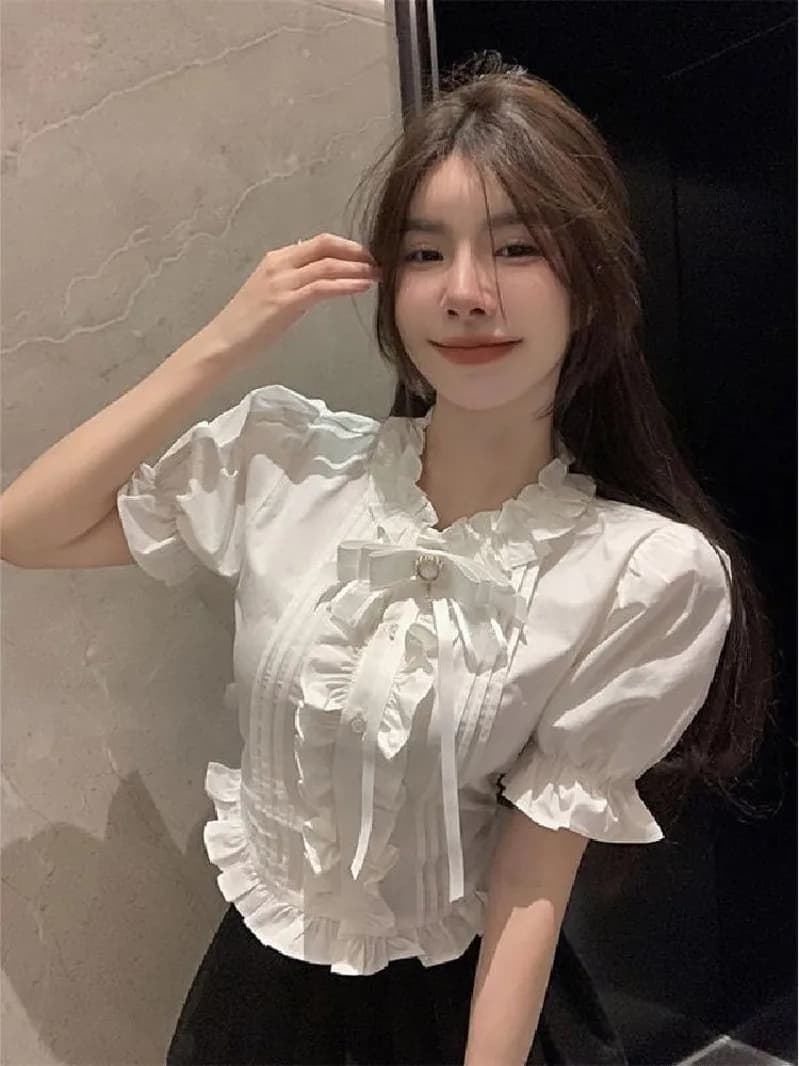 Chemises à manches bouffantes pour femmes, blanches, à volants, élégantes, vintage, pour le bureau, 