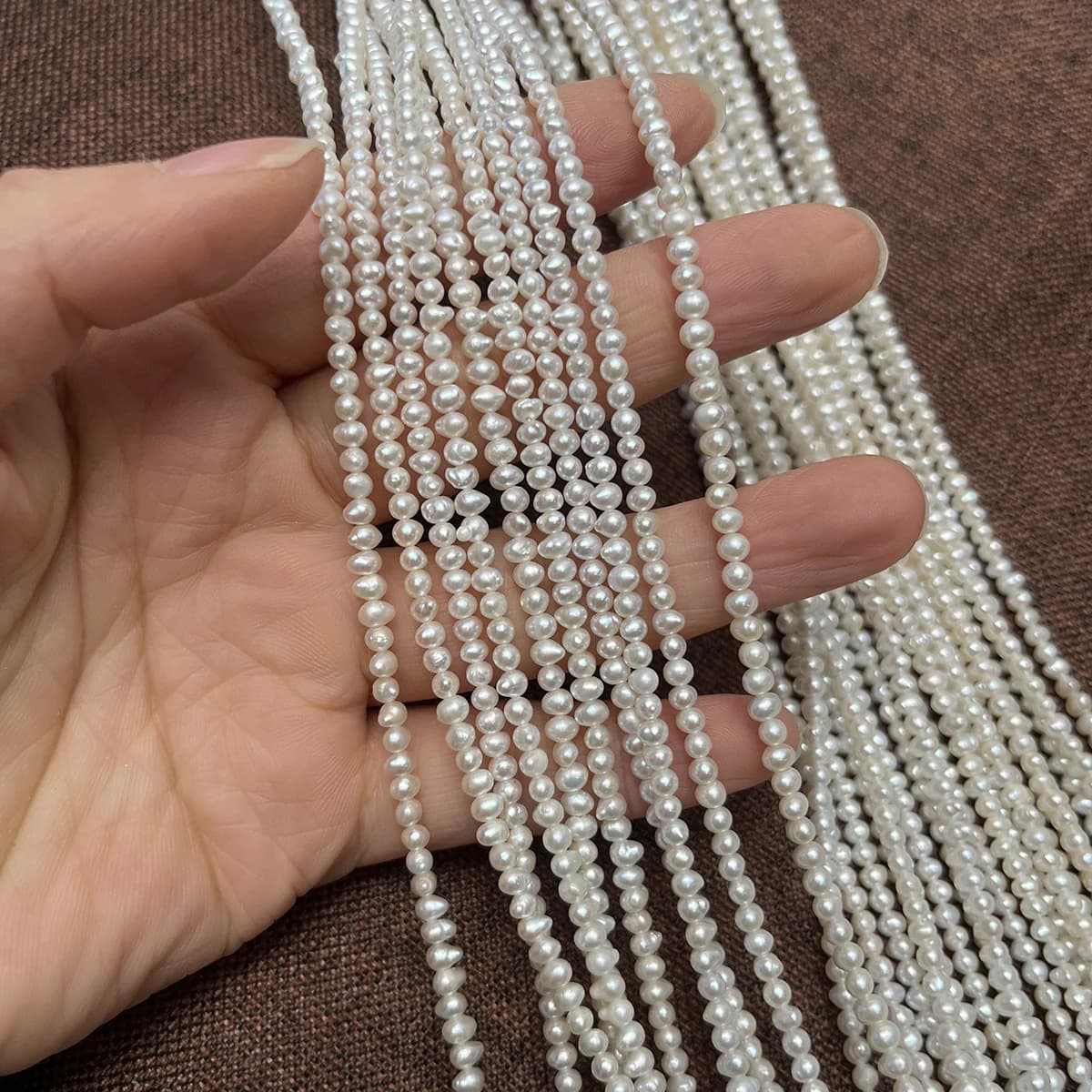 Petite perle d'eau douce 2-2.5mm, perles d'isolation amples rondes polies pour la fabrication de bij