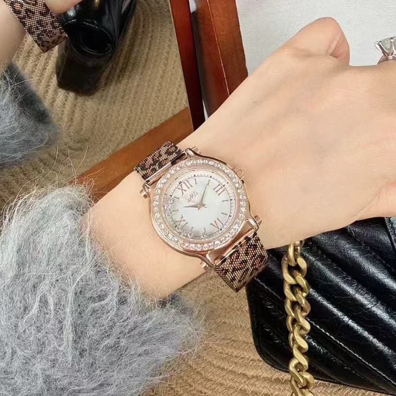 Montre de luxe à Quartz pour femmes, bracelet en maille d'acier léopard, Design créatif haut de gamm