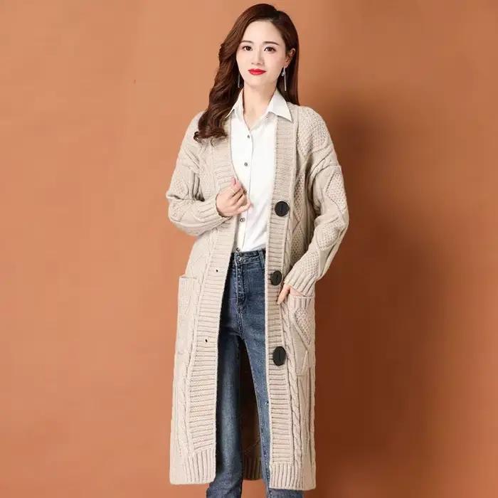 Cardigan en tricot torsadé épais à manches longues avec capuche et poches