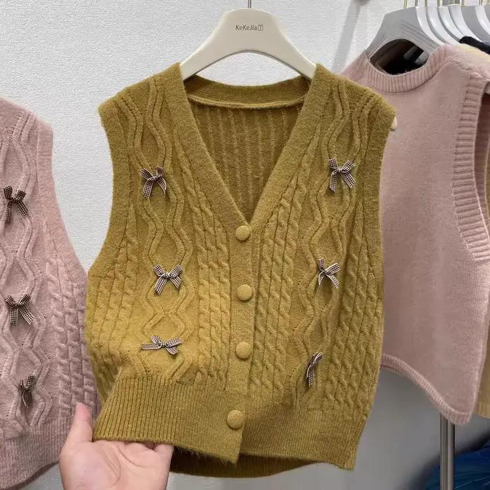 Nouveau tricot gilet manteau femmes printemps automne 2026 pull sans manches femme court Cardigan haut de gamme dames