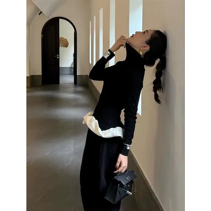 Pull à col roulé vintage noir avec patchwork et volants pour femmes automne hiver élégant et ajusté