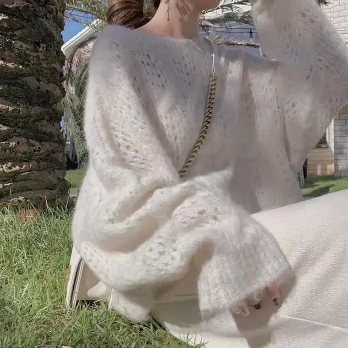 Pull évidé en mohair rose pour femme