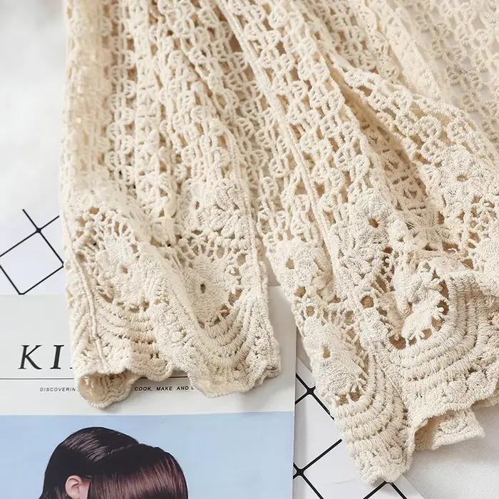 Cardigan en dentelle ouverte au crochet pour femme