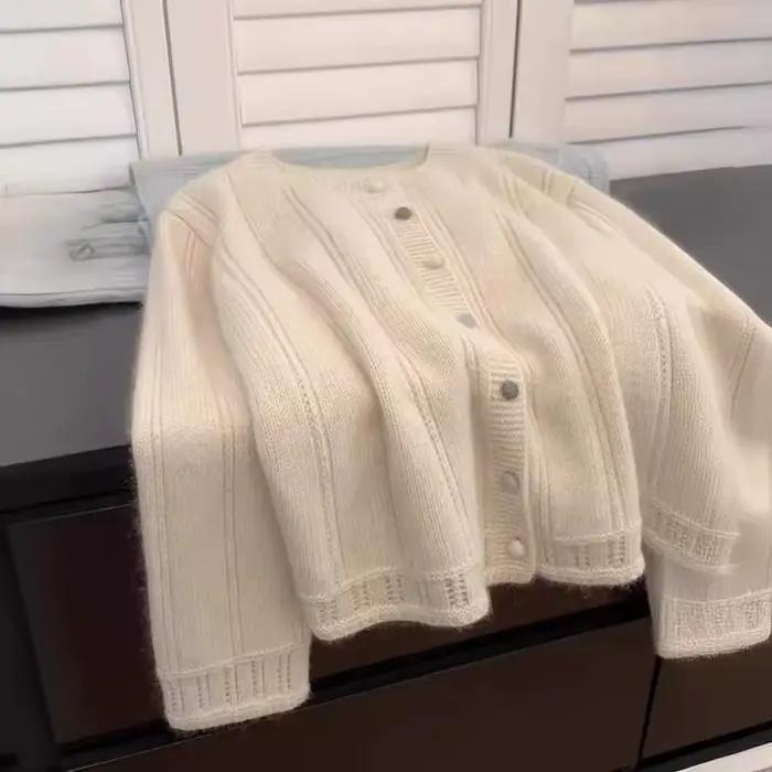Femmes tricoté pull torsadé creux automne hiver Chic ample à manches longues Cardigan hauts Vintage solide