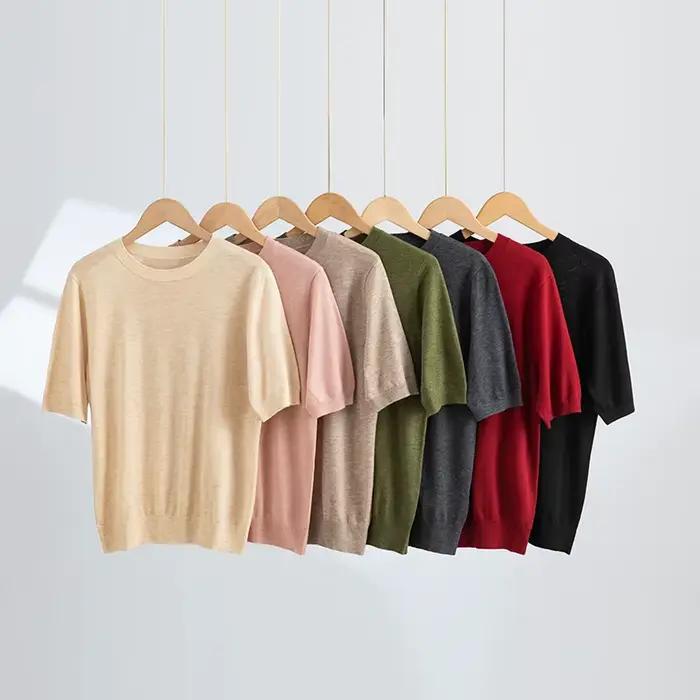 Pull en laine peignée à col rond et manches courtes pour femme
