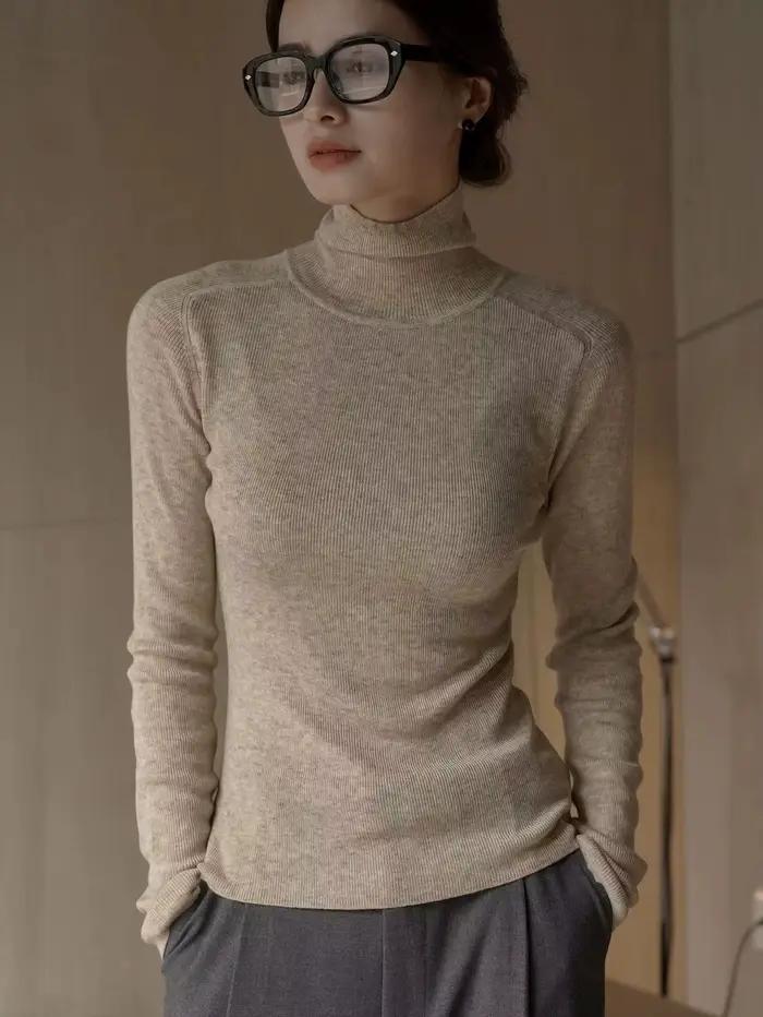 Pull en laine à manches longues et col haut pour femme