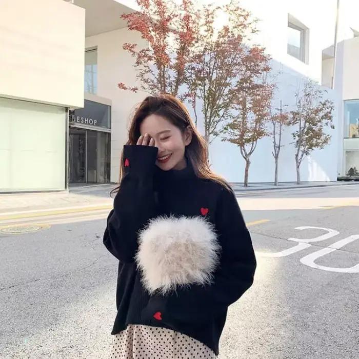 Pull à col roulé brodé pour femme