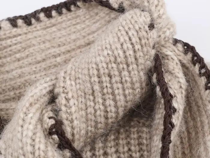 Pull tricoté à manches longues et col montant pour femme
