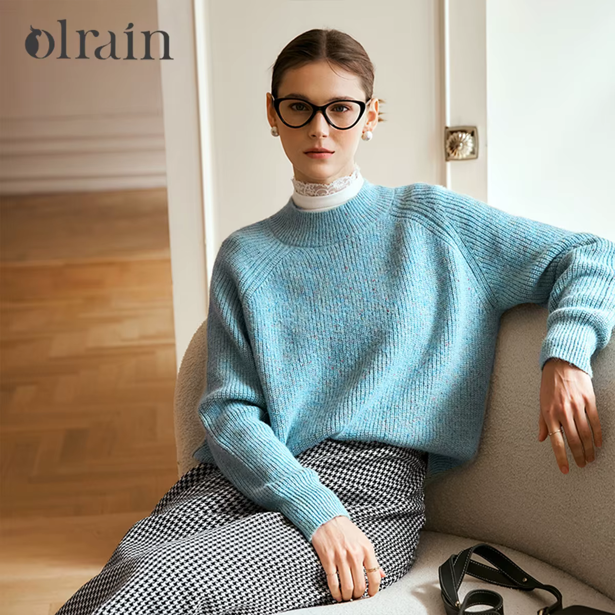 Pull en laine bleu pour femme OLrain, collection automne 2026, col rond, manches longues, coupe ampl
