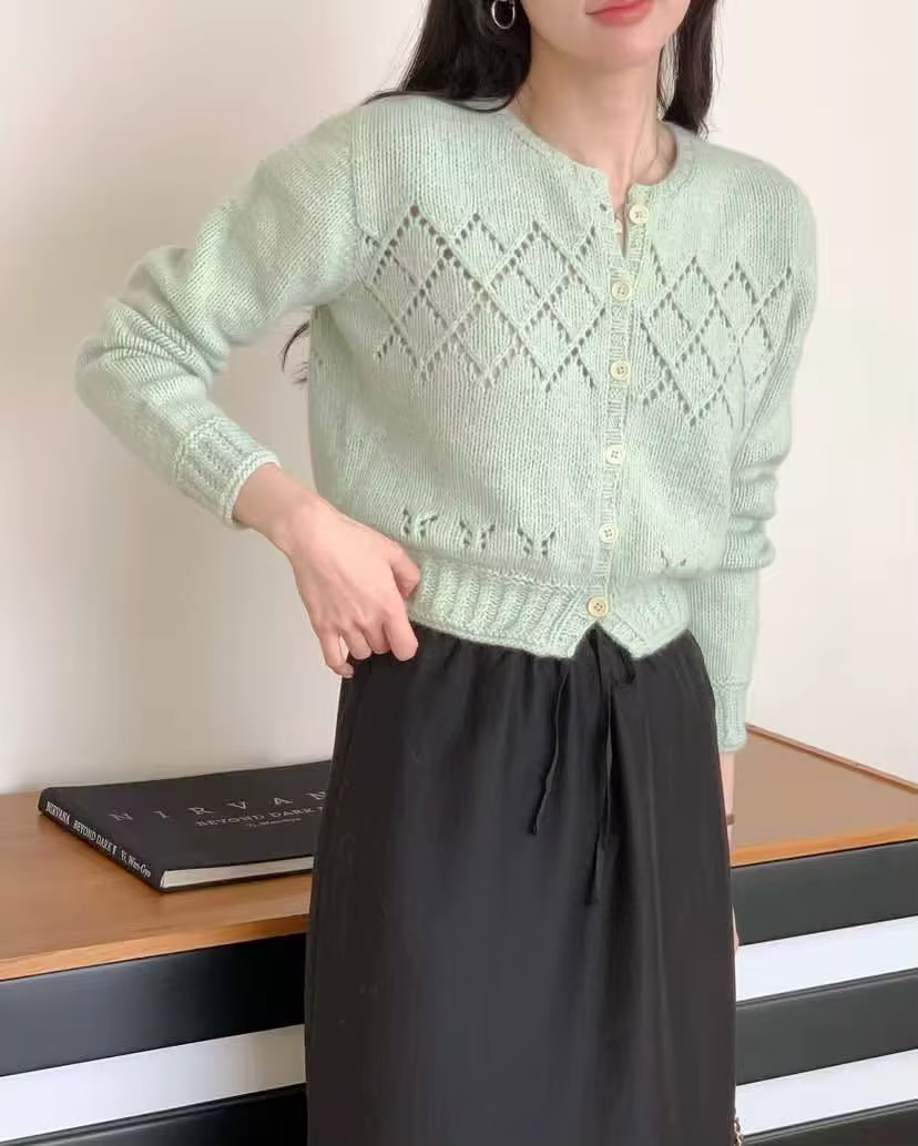 Pull en maille de haute qualité à manches longues avec un style ajouré tendance et une touche de raf