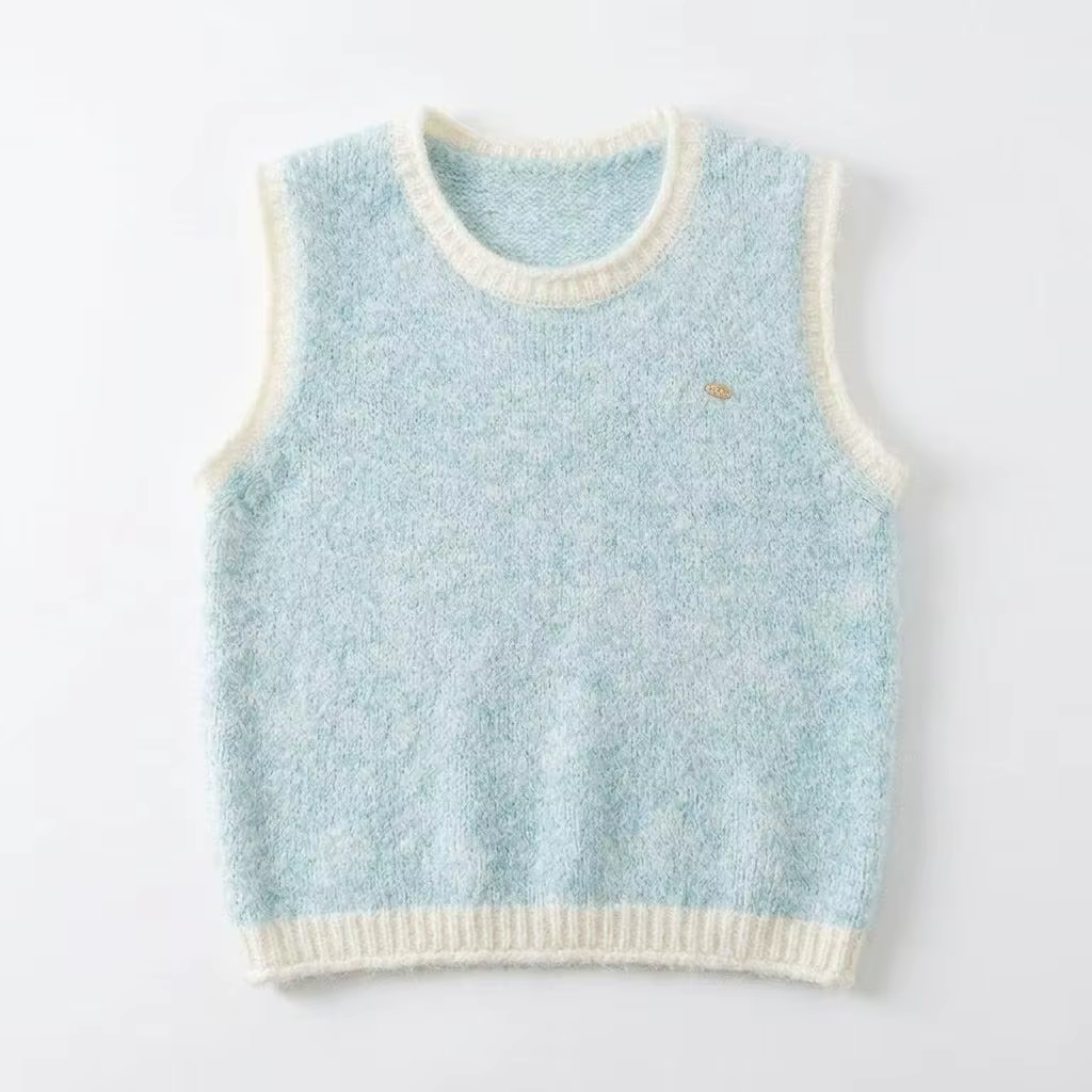 Gilet en tricot pour femme : un gilet ample à col rond et color-block, idéal pour la superposition.
