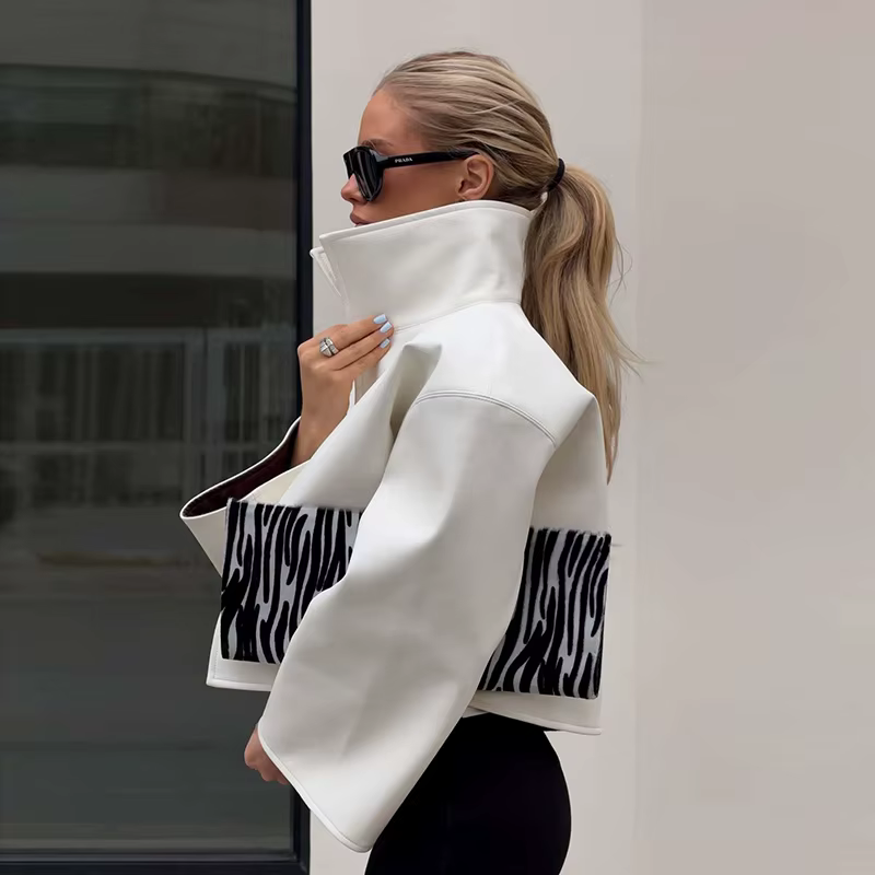 Manteau court asymétrique en cuir à col montant et manches évasées pour femme, collection automne 20