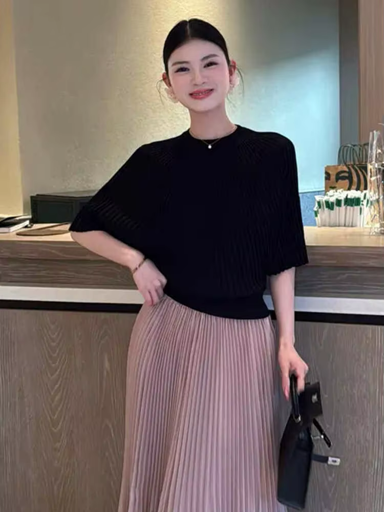 Pull tricoté noir tendance à col rond pour femme