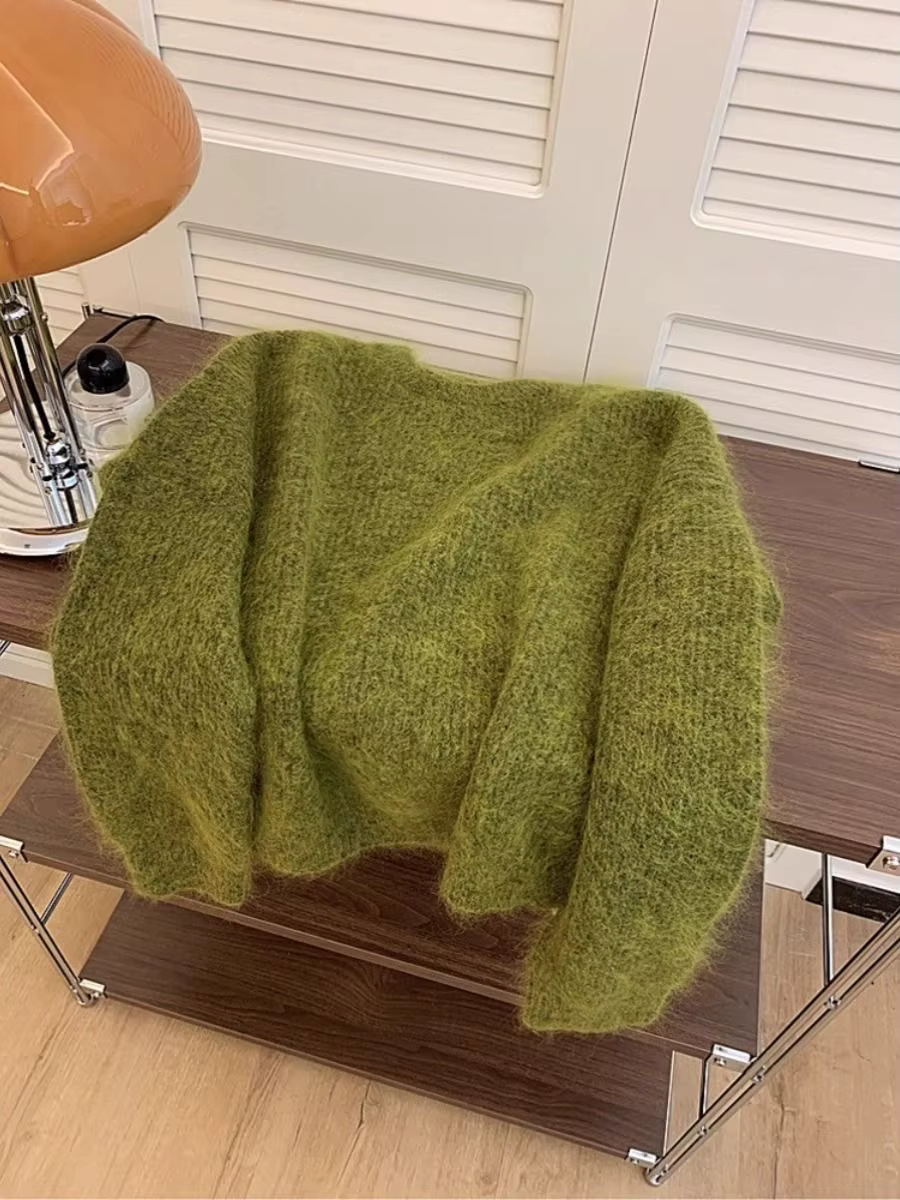 Pull tricoté à manches longues et col rond pour femme