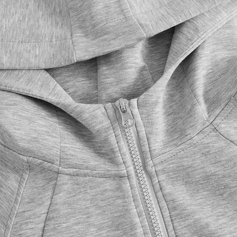 Sweat-shirt à capuche gris avec fermeture éclair pour femme
