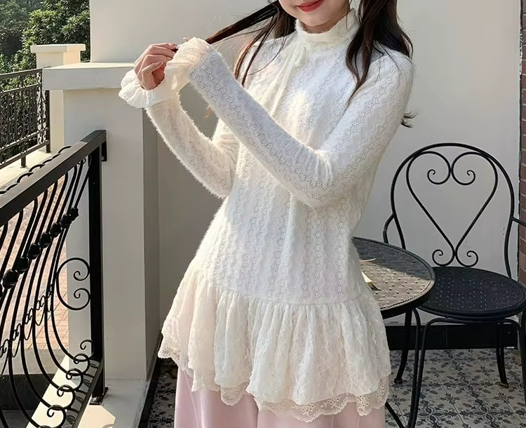 Pull en tricot texturé à nœuds en dentelle