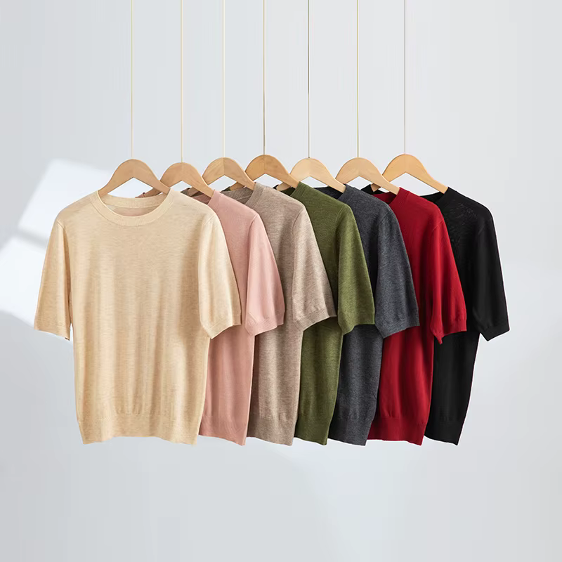 Pull en laine peignée à col rond et manches courtes pour femme