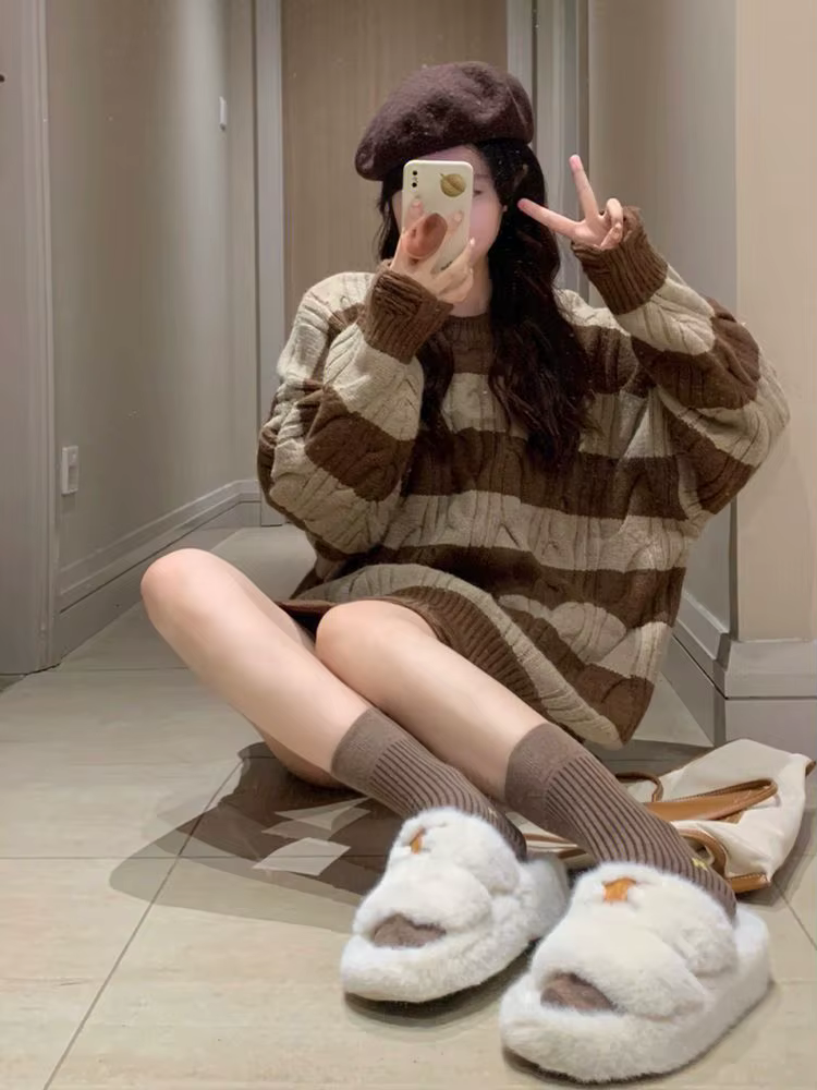 Pull rayé torsadé déchiré pour femme