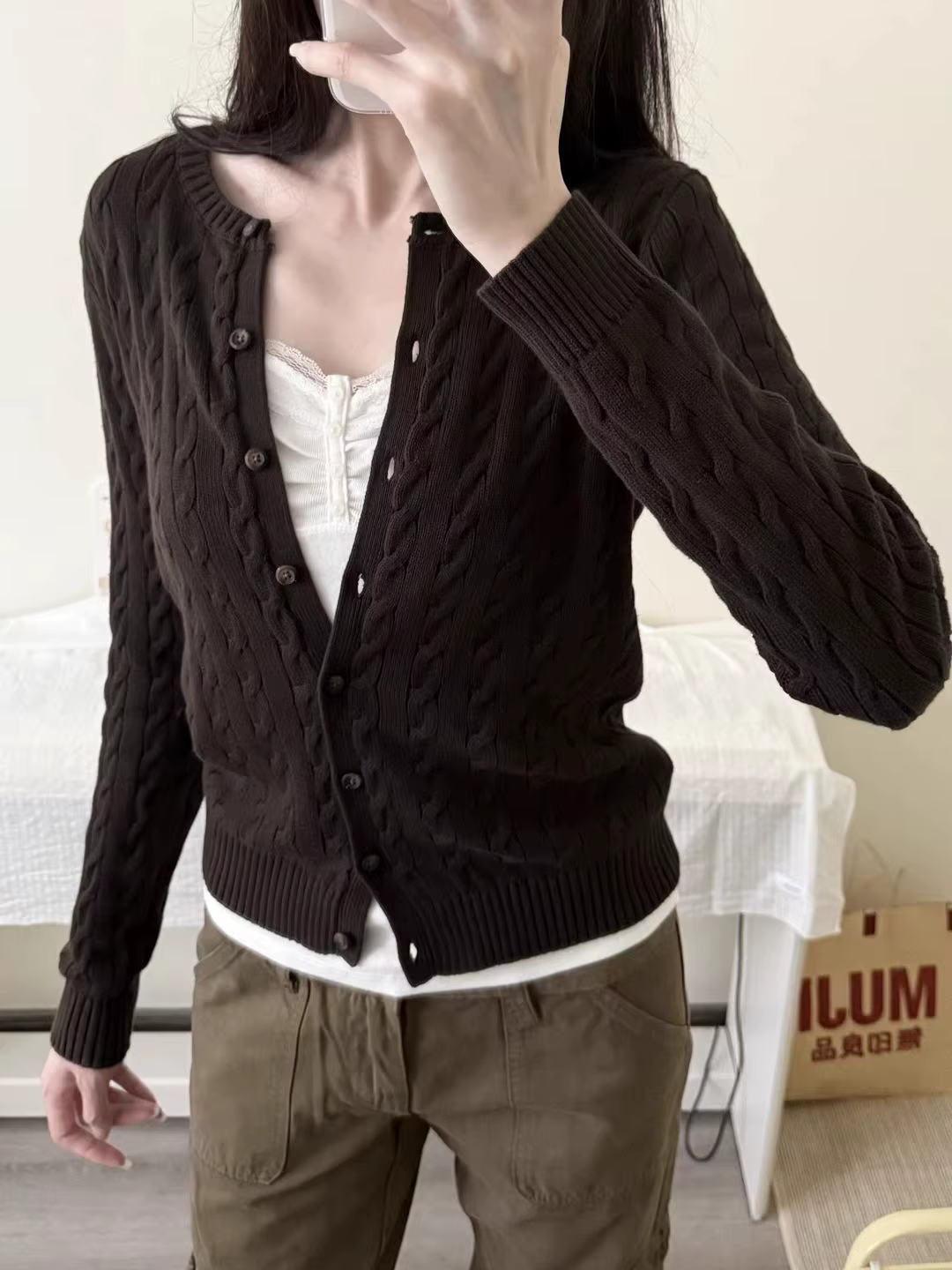 Cardigan à fleurs torsadées