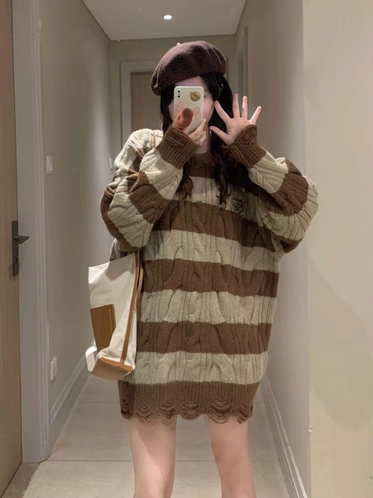 Pull rayé torsadé déchiré pour femme