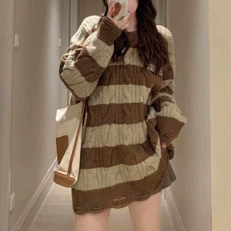 Pull rayé torsadé déchiré pour femme