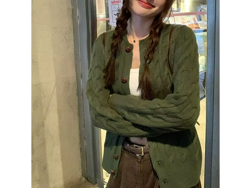 Pull-over vintage vert torsadé pour femme