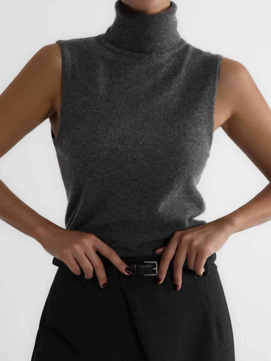 Pull tricoté sans manches à col roulé blanc pour femmes