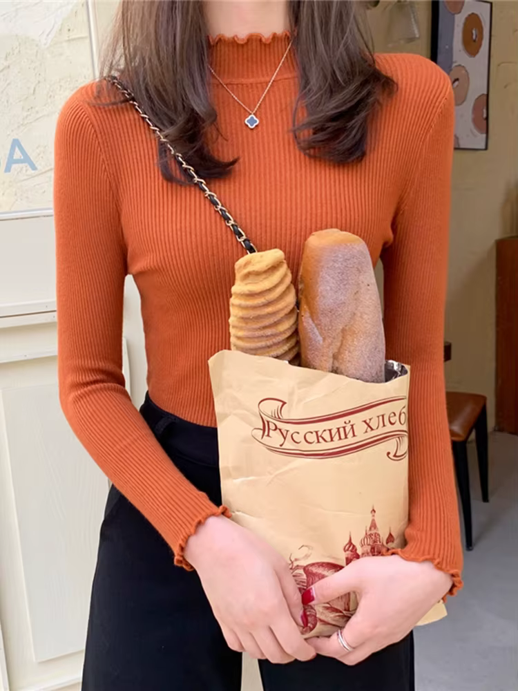 Pull à col roulé à volants pour femmes